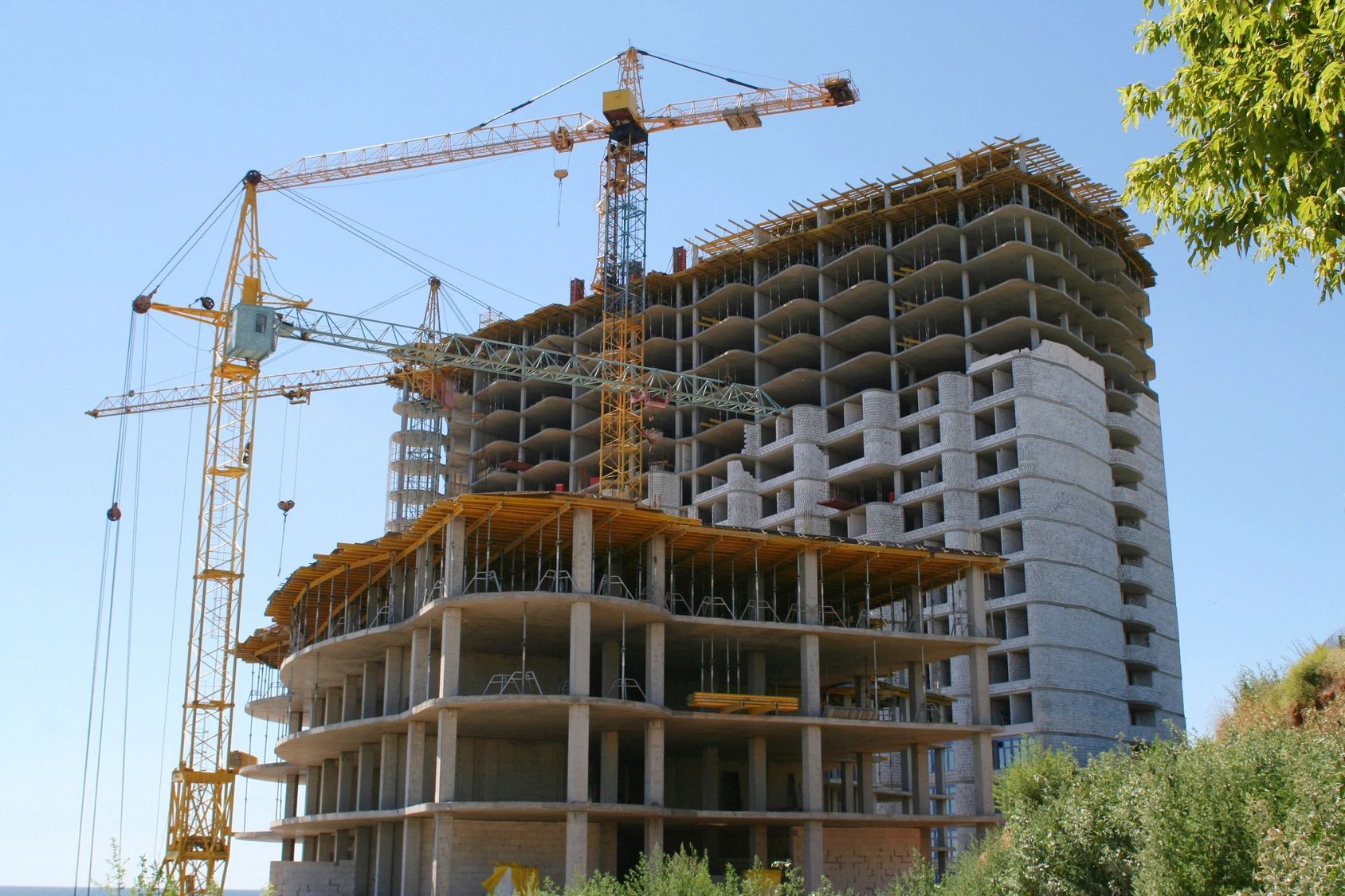 High-rise residential construction with cranes
