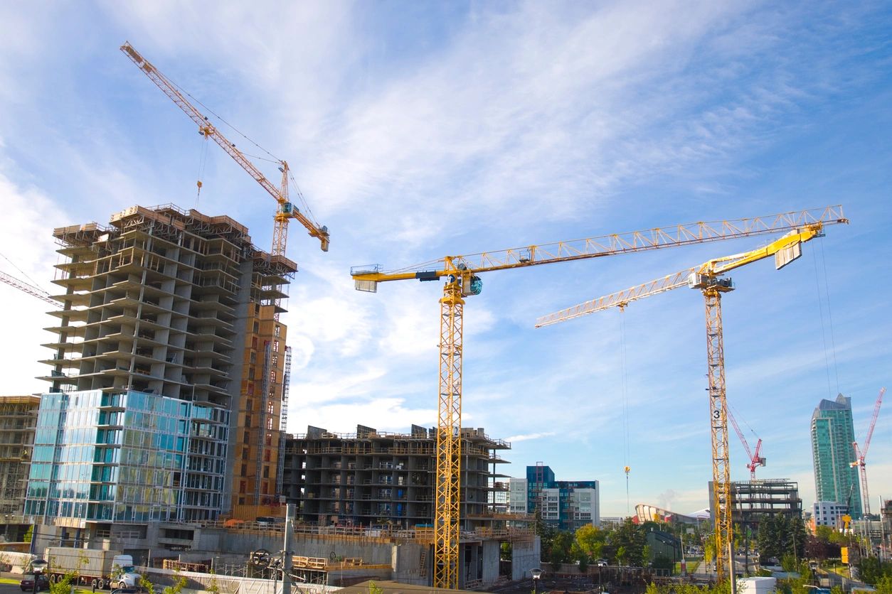 Urban construction site tower cranes skyline